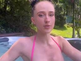 Busty babe playing with her big boobs